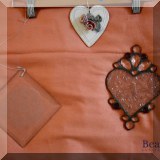 D47. 3-Piece lot. Two sun catchers and a ceramic hanging heart. - $20 for the set 